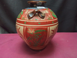 An earthenware and pain tea Jar
H.22
W.17