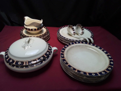 An 8 piece part woodware dinner server A/F tureen