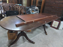 A Regency style Mahogany Pedesful table tall with 2 extra leaves two seat 8-10
W.100
L.160
H.75