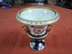 A Sevres style vase in Royal blue with hand painted panels and rich gilding. W.15 cm H.18 cm