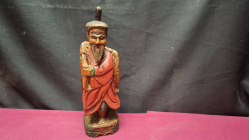 Old Chinese hand carved wooden flowers of an immortal over 100 year old. 27 cm high