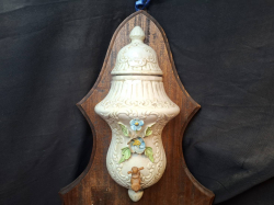 A Lovely wall hanging ceramic water holder decorated with flowers 
L.78
W.38