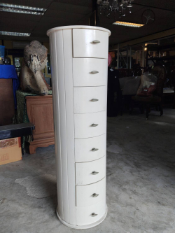 A Tall Cylindrical Slender White 8Multi-Drawer Chest. 
H.100Cm.
D.31Cm.