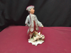 A WEDGWOOD porcelain figurine THE RAKE 