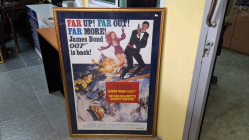 A framed and matted one sheet American James Bond art poster for the 1969 film 