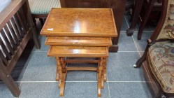 A High Quality Yew wood nest of table.
L.51cm.
W36cm.
H.54cm.