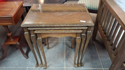 A Nice figured Mahogany nest of tables on Cabriloze legs 
and glass top
L.54cm.
W.39cm.
H.56cm.