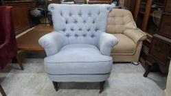 An Old classic armchair light blue fabric