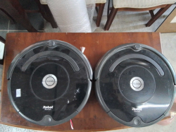 A Pair of potary auto natic floor cleaners 