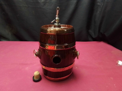 Suntory whisky barrel complete with original fixings it has a Royal Stlye  heraldic crest in the front supported by a ilon and a unicorn 