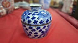 A blue and white porcelain covered bowl slight damages. AS seen. Approx size H.16 cm W.15 cm