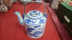 A blue and white porcelain cylindrical teapot painted. H.to top 30 cm W.22 cm