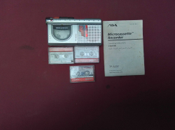 A mini tape recorder with 3 tapes 