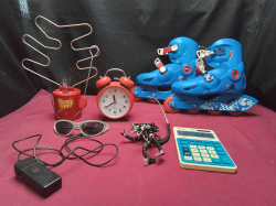 A Job lot of Roller scates alarm clock etc