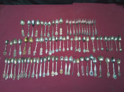 A Box of Forks and Spoons Commemorative 90% silver pated 70 piece 