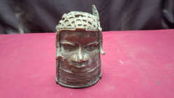 A bronze Benin Memorial Head. 13cm. high 9 cm. wide 
