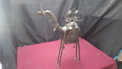 Antique bronze or brass camel and rider sculpture the traditional lost-wax casting method. 56 cm high 37 cm wide