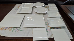 A small nice set white China dining plates