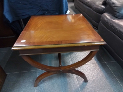 A Mahogany occasional table with H stretchers. W.58 x58 Cm H.51 cm