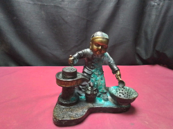 A very old Antique bronze boy grinding soybeans in traditional stone hand mill rare for age 18x18cm 