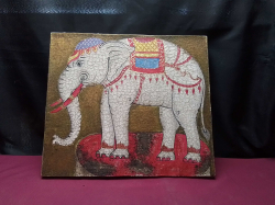 An Oil on Canvas of A very colorful elephant 
W36cm.
L.40cm.