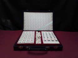 A old Chinese Majong set complete tile selection incuding dice and scoring sticks in original velvet box 
