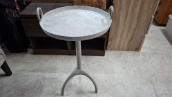 A vintage stye amulumium round side table with handle
