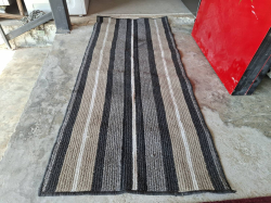A small rug. size 61x148 cm