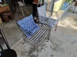 A pair of Wrought Iron Patio Chair with cushions