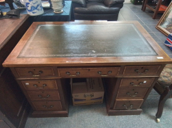 A good small size pedestal desk with cross banding to top and Drawers. W.65 Cm L.106 Cm. H.72cm