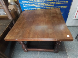 A Small square coffee table.W.61 Cm H.43 cm