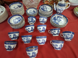 A coffee pot and 12 Trios and other bowls plates, in 