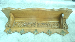 An Oak coat shelf 5 hook 
L83cm.
W24cm.