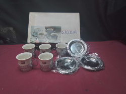 Demitasse coffee set featuring white porcelain cups in ornate silver toned metal filling holders with a matching central tray used for expresso or trurkish coffee in original box