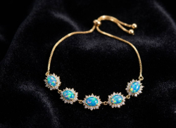 Beautiful gold plated bracelet with synthetic opals