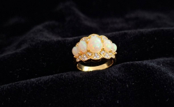 Beautiful gold plate ring with  synthetic opals. 