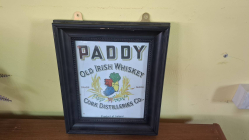 A Famed Irish Paddy whishkey sign picture. Size 29x34 cm