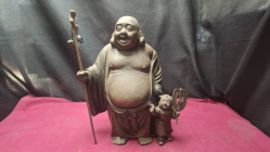 Cast iron statue of Hotei (or Phra Sangkatchai paired with a Karako (ancient Chinese child) Dimensions W.27 cm. H.40 cm