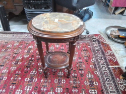 A 1920 marble top oval occasional table with bergiere bottom shelf
W38cm
L44cm.
H67cm. 