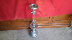 Silver-tone metal candleholder. H.71 cm W.19cm