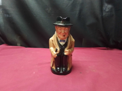 A Toby Jug of Winston Churchill 'by Royal Doulton
W 12cm.H23cm. 