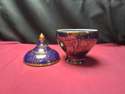 A beautifull Thai Benjarong covered jar floral pattern over cobalt with continuous Gold leaf detailing 25cm. x16cm.as new mint condition 