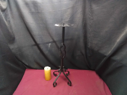 A Wrought Iron Candle stand 
H62cm.
W9.8cm.