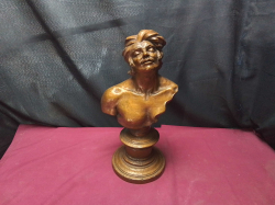 A man's bust in Terracotta it is signed 
W17cm.
H42cm.
