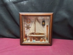 A Nice sailing boat montage Framed wall hanging 
W29cm.
H29cm.