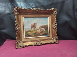 A Gilt Framed Oil on Board of mountain sheep 
W41cm.
H36cm.