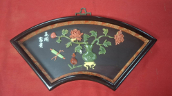 A beautiful framed cut jade potted flowers display
