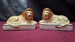  A rare pair of antique crackle glazed Staffordshire seated lions 10cm high x 15cm wide