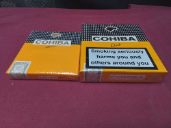 A pack of cohiba mini and a pack cohiba club