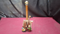 A vintage style tissue holder clown figurine